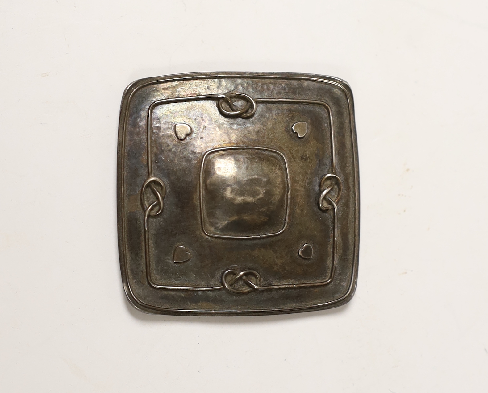 An Edwardian Arts & Crafts Liberty & Co Cymric belt buckle section (incomplete), Birmingham, 1902, 48mm.